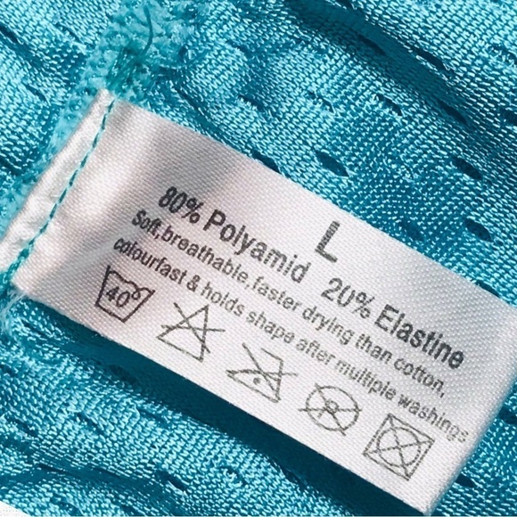 Turquoise Blue Sports Netted Shorts with Black Print - Picture 2 of 4